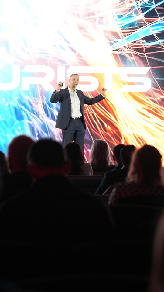 AI keynote speaker Ross Dawson on stage at the Futurist Summit in Dubai